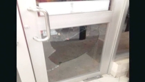 Provocan daños en tienda Oxxo