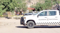 EN EMPALME Acribillan a policía